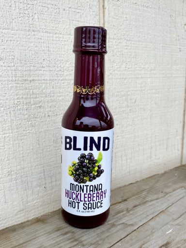 Blind Montana Huckleberry Hot Sauce. 5 oz. glass bottle. Made in Montana.