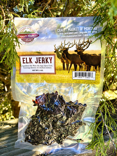 Chalet Market Elk Jerky. Thinly sliced and marinated whole muscle jerky. Expertly seasoned. 2 oz. vacuum packed package.