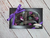 The Montana Chocolate Company Chocolate Huckleberry Swoons, 12pc Huckleberry Includes an equal number milk, dark and white chocolates  Hand-crafted in Stevensville, MT 12-piece collection, Black Box with Purple Ribbon 