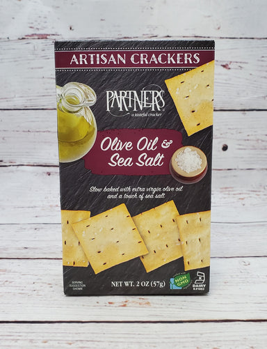 Partner's Olive Oil and Sea Salt Crackers  2 oz. package  Delicious thin & crisp cracker with a hint of natural sea salt   Made with non-GMO ingredients   A perfect addition to any gift box Partners is a family owned company  Allergy information:  Contains wheat and dairy  Partner's Olive Oil and Sea Salt Crackers 2 oz.  A delicious thin & crisp cracker-perfect with our summer sausages and cheese.  Made with non-GMO ingredients.  A perfect addition to any gift box.