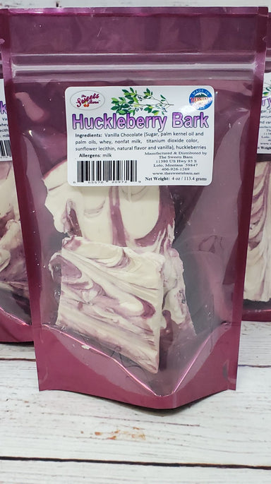 Sweet Barns signature Huckleberry Bark is made with real huckleberries and swirled with the huckleberry juice.  Add to any Gift Box for a rich treat 4 oz. Made in Lolo, Montana